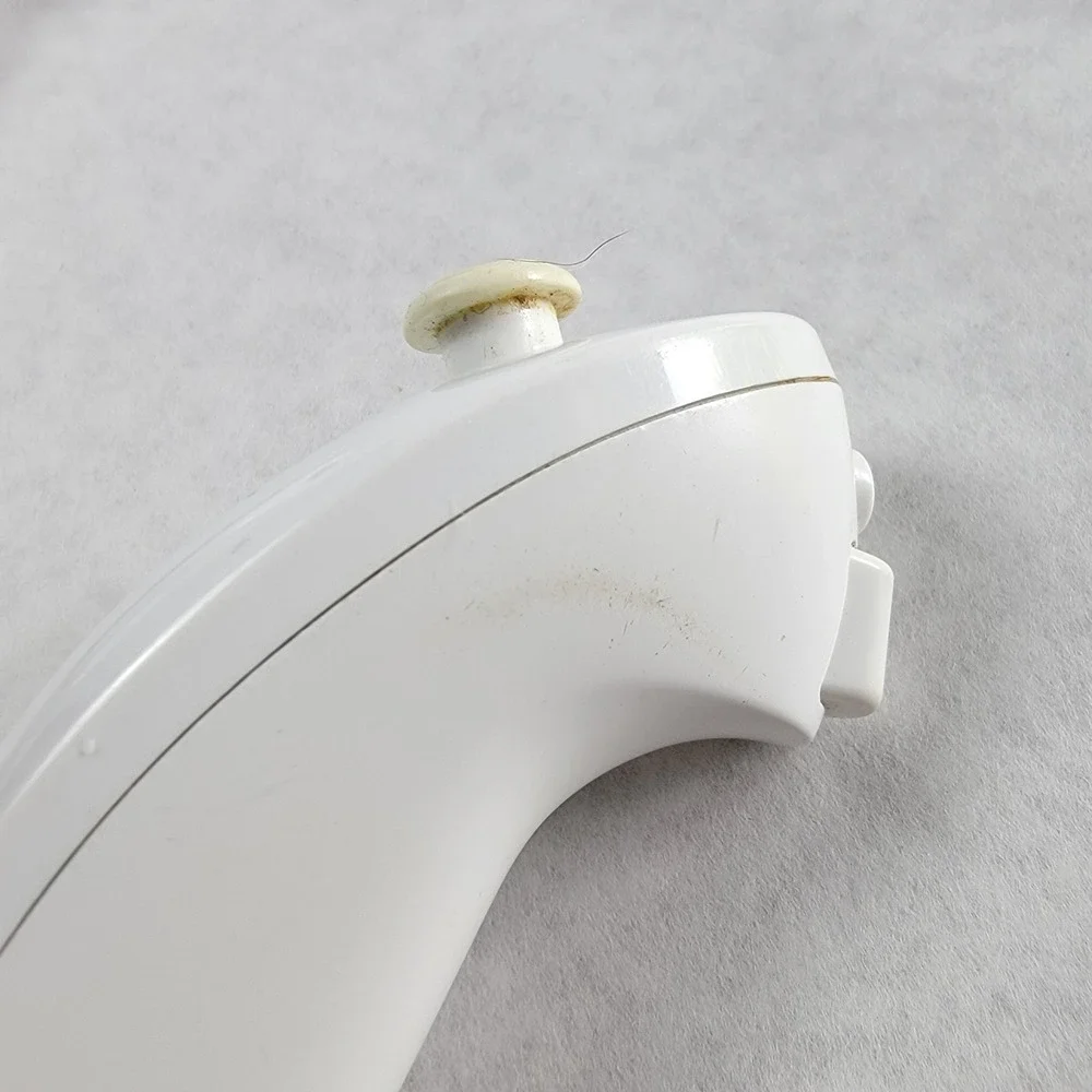 Nintendo Wii Accessory Bundle White Wii Wheel RVL-024 and 2 Nunchucks RVL-004